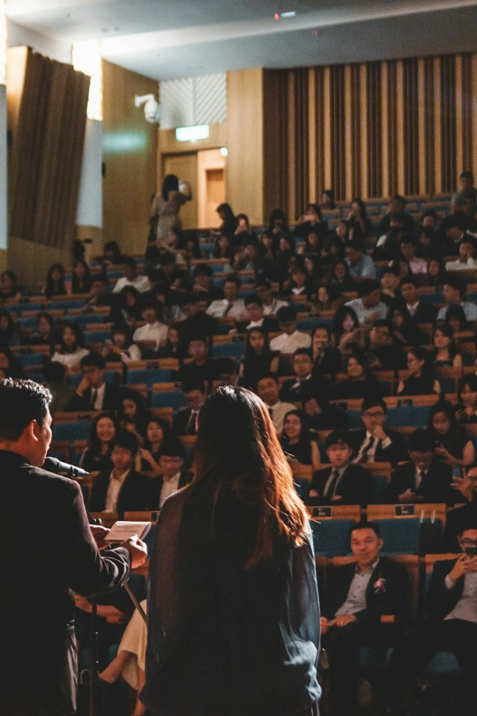 people sitting on chair inside room